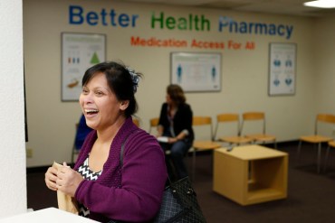 Jinky Balane, 53, picks up asthma medicine for her son at the Better Health Pharmacy, which is staffed by volunteer pharmacists and run by the Santa Clara County Public Health Department in downtown San Jose, Calif.ornia on Feb. 10, 2016. The surplus drug redistribution program is the first in California. (Josie Lepe/Bay Area News Group)