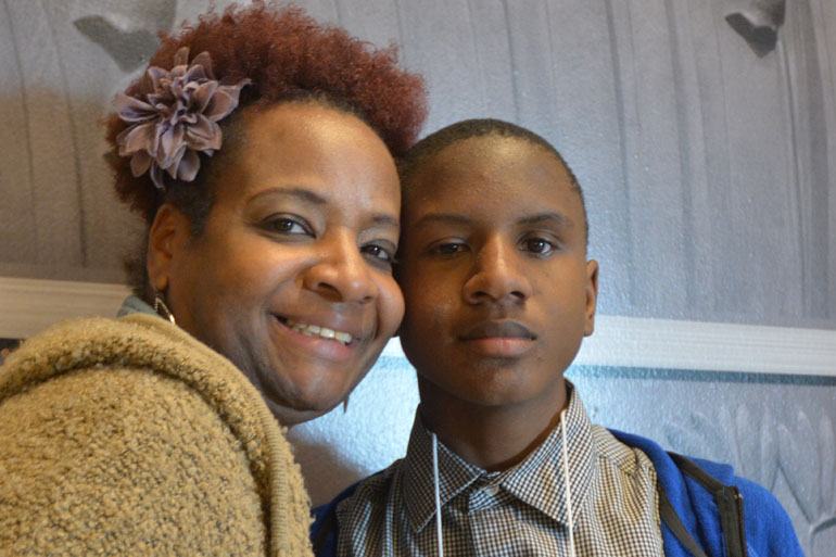 Lisa and Jaheen Finnie of Brentwood. Jaheen is 14 and has a rare condition that, since he was 3 years old, sometimes causes his brain fluid to leak, and that prompts episodes of meningitis. (David Gorn/California Healthline)