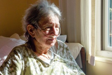 Audrey de Jesus, 83, filled out a Physician Orders for Life-Sustaining Treatment form at Chaparral House in Berkeley. De Jesus has seven children and said the form tells them exactly what she wants – comfort-focused treatment -- so there aren’t any questions in an emergency. (Anna Gorman/KHN)
