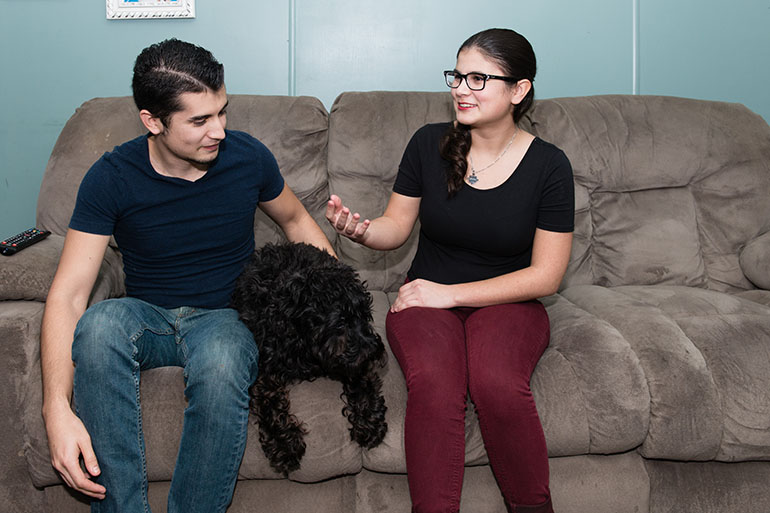 Rosemary Navarro’s 22-year-old son, Ricardo, and her 19-year-old daughter, Lizeth, live with her in a three-bedroom trailer in La Habra, Calif. They depend heavily on her, both emotionally and financially. (Heidi de Marco/California Healthline)