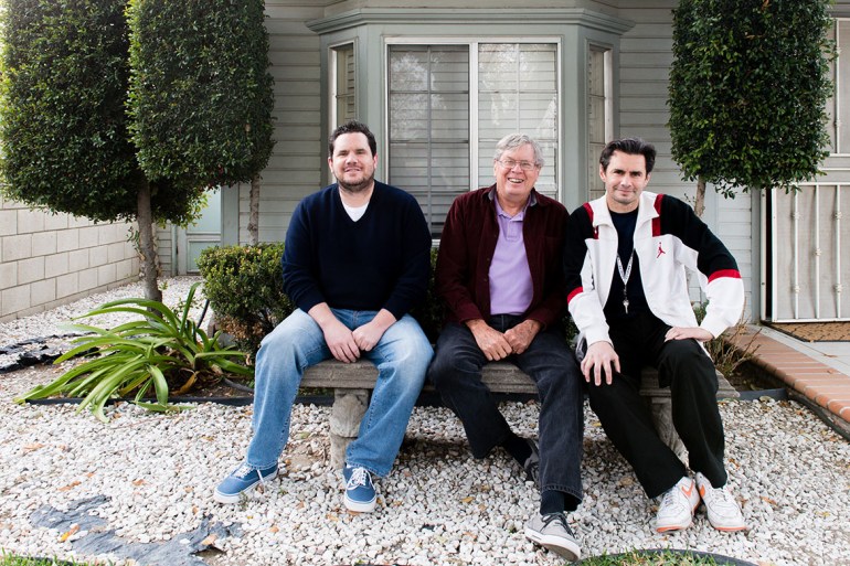 John, left, and Jay Kitchen, right, with their father in Colton, Calif., in late 2015. (Heidi de Marco/California Healthline)