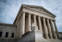 A view of the front portico of the United States Supreme Court building in Washington, DC.