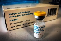 A photo shows a vial of the Jynneos vaccine next to a box.