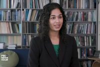 A screenshot of Aneri Pattani speaking on PBS Newshour.