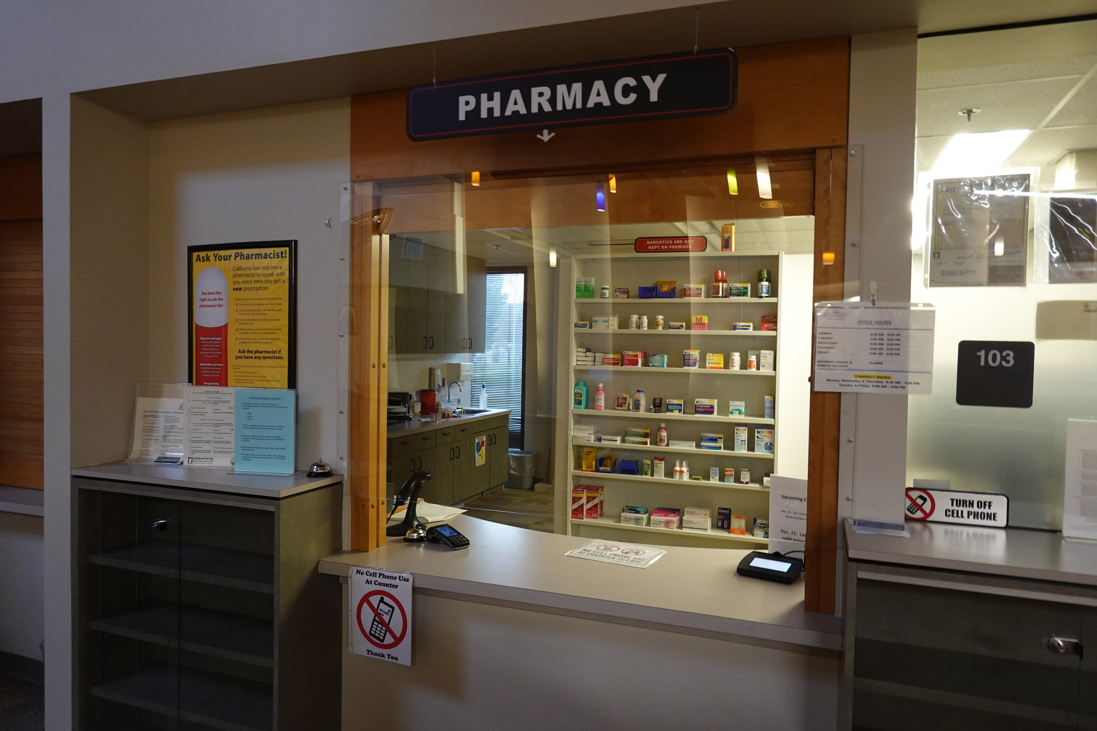 A photograph of the pharmacy desk inside California State University-San Bernardino’s Student Health Center.