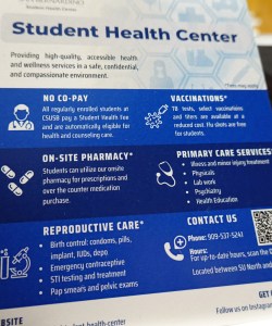 A card for the California State University-San Bernardino’s Student Health Center. It lists services, such as "Vaccinations, on site pharmacy, primary care services, and reproductive care."