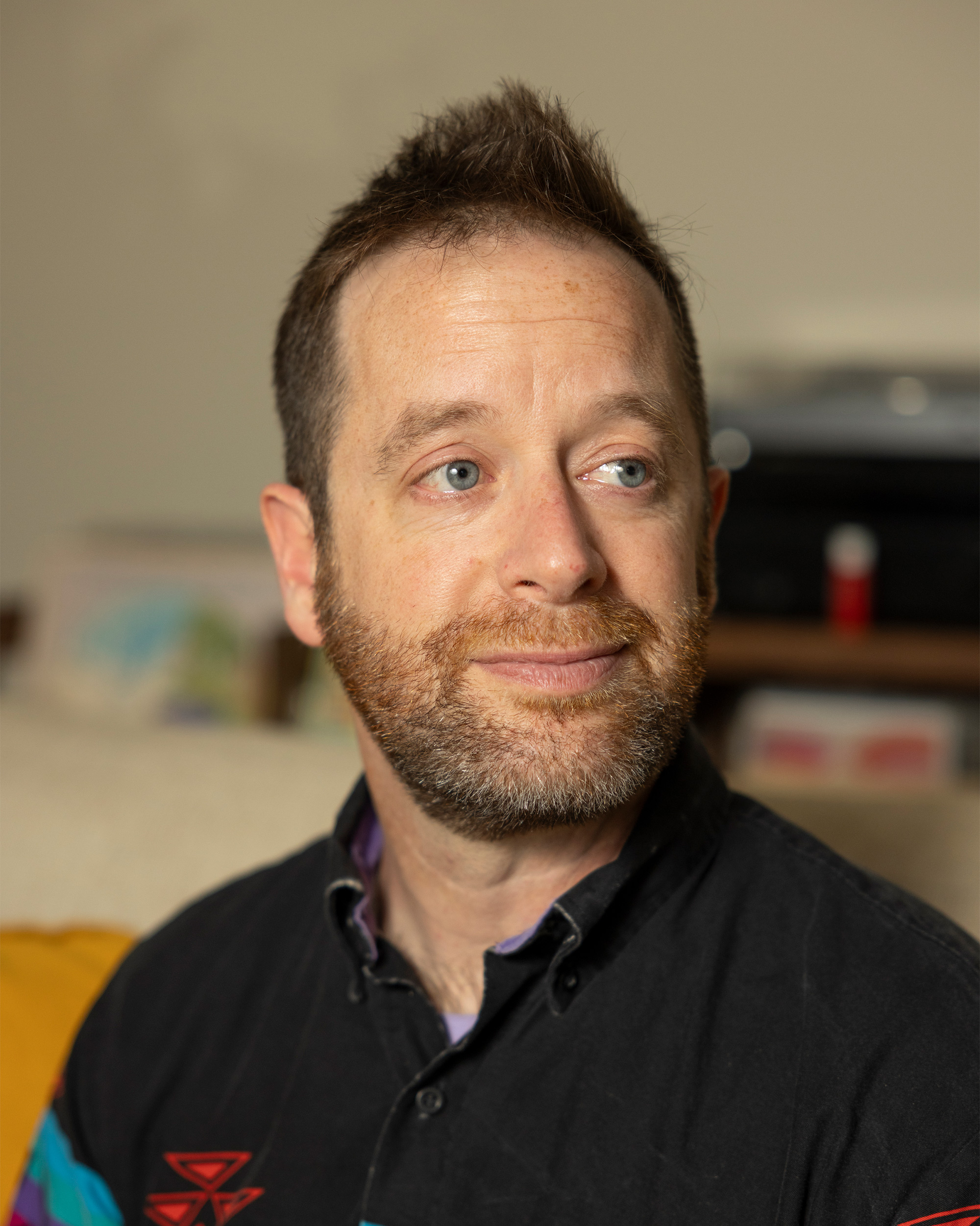 A photo of David Engler sitting indoors.