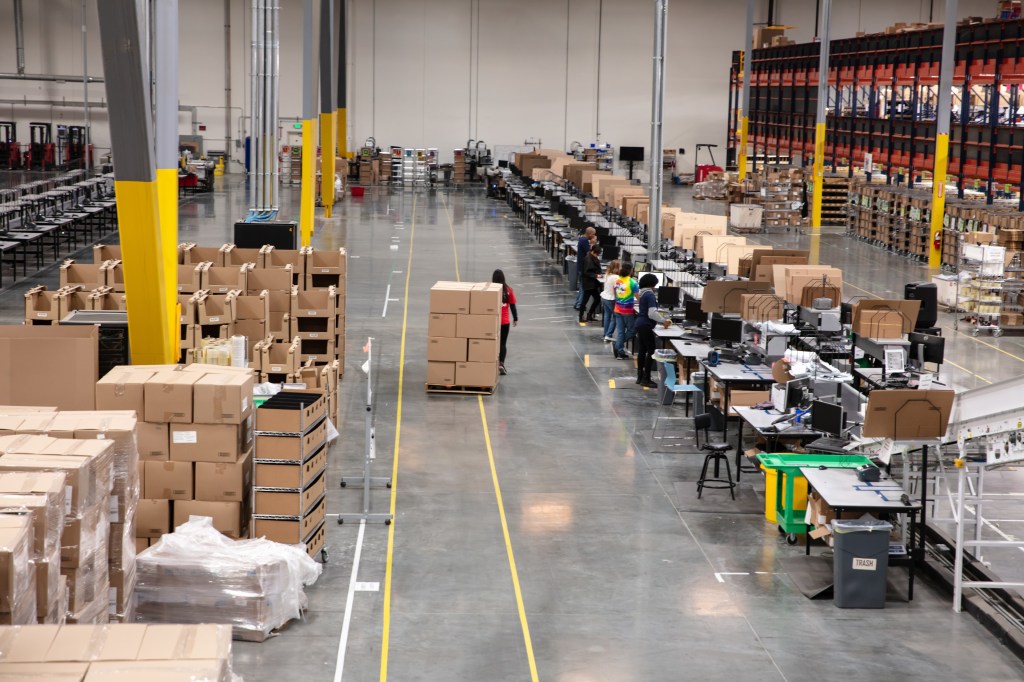 An aerial view of the inside of a fulfillment center.