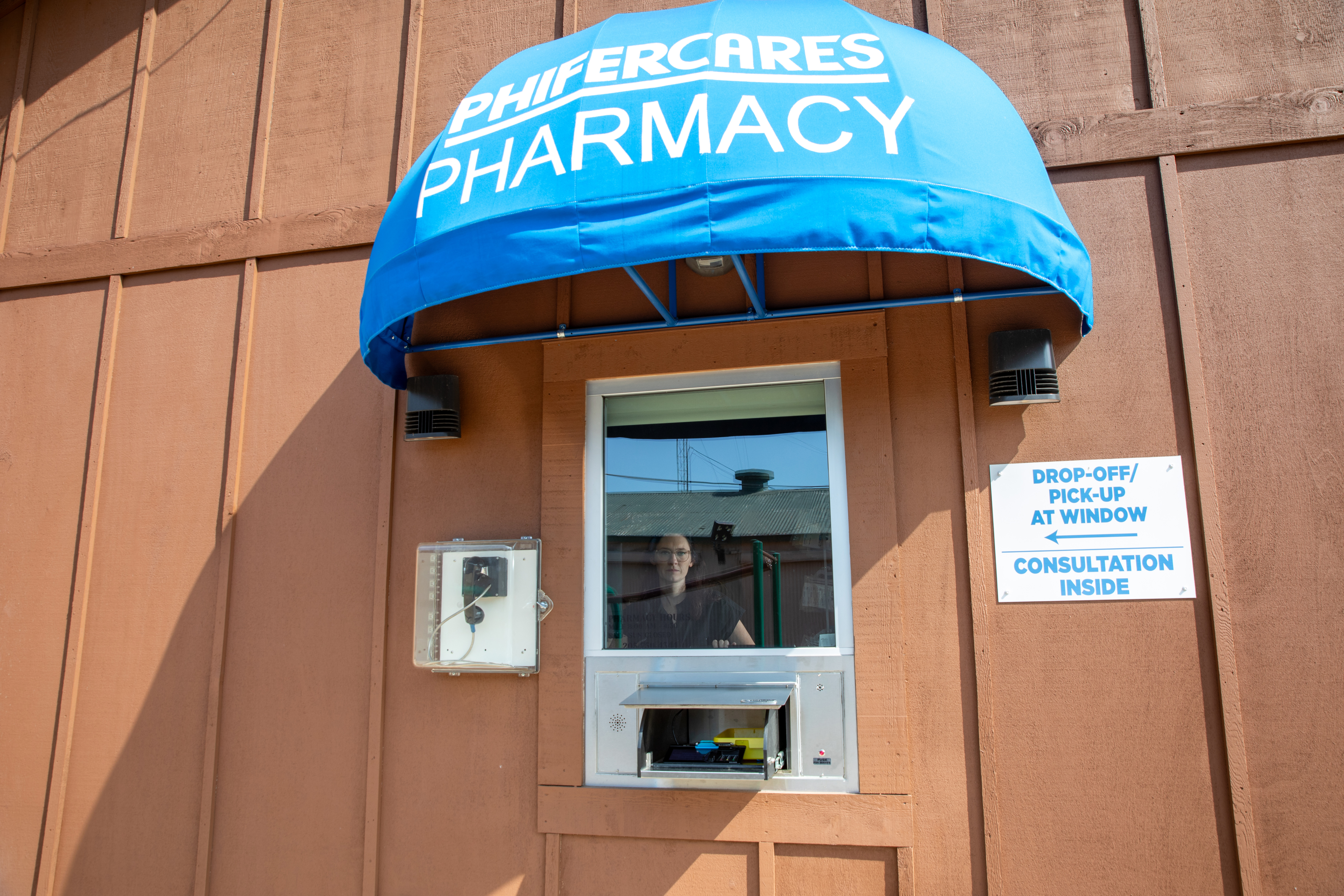 A drive-thru window for a pharmacy