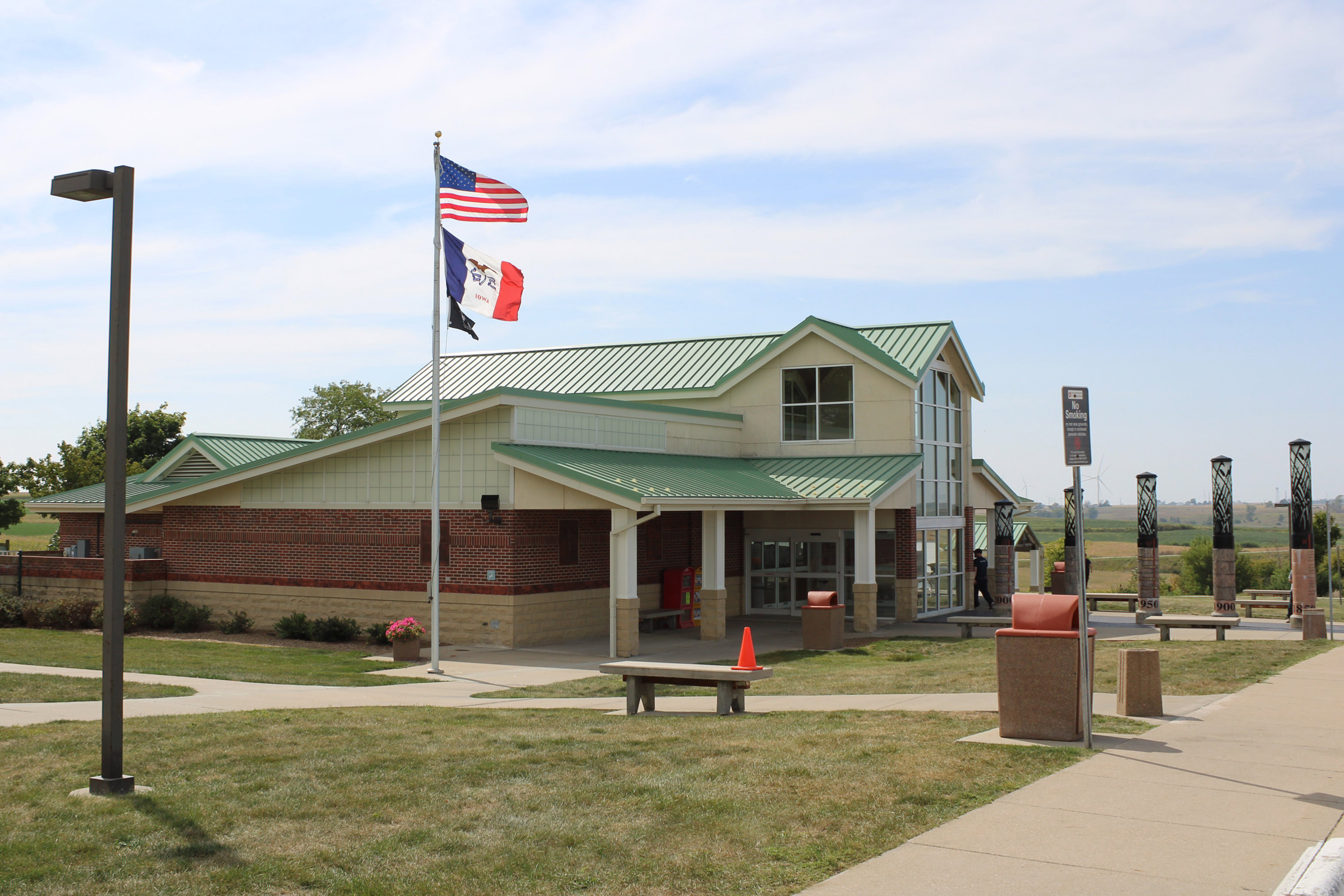 A photo of the outside of a rural rest stop.