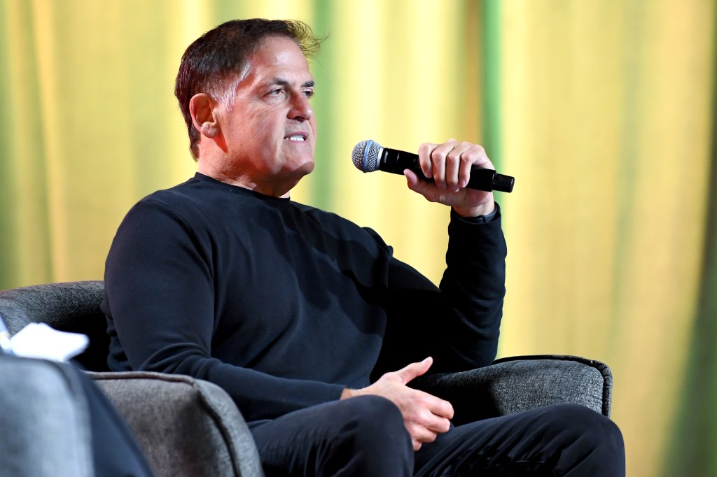 A photo of Mark Cuban speaking into a microphone.