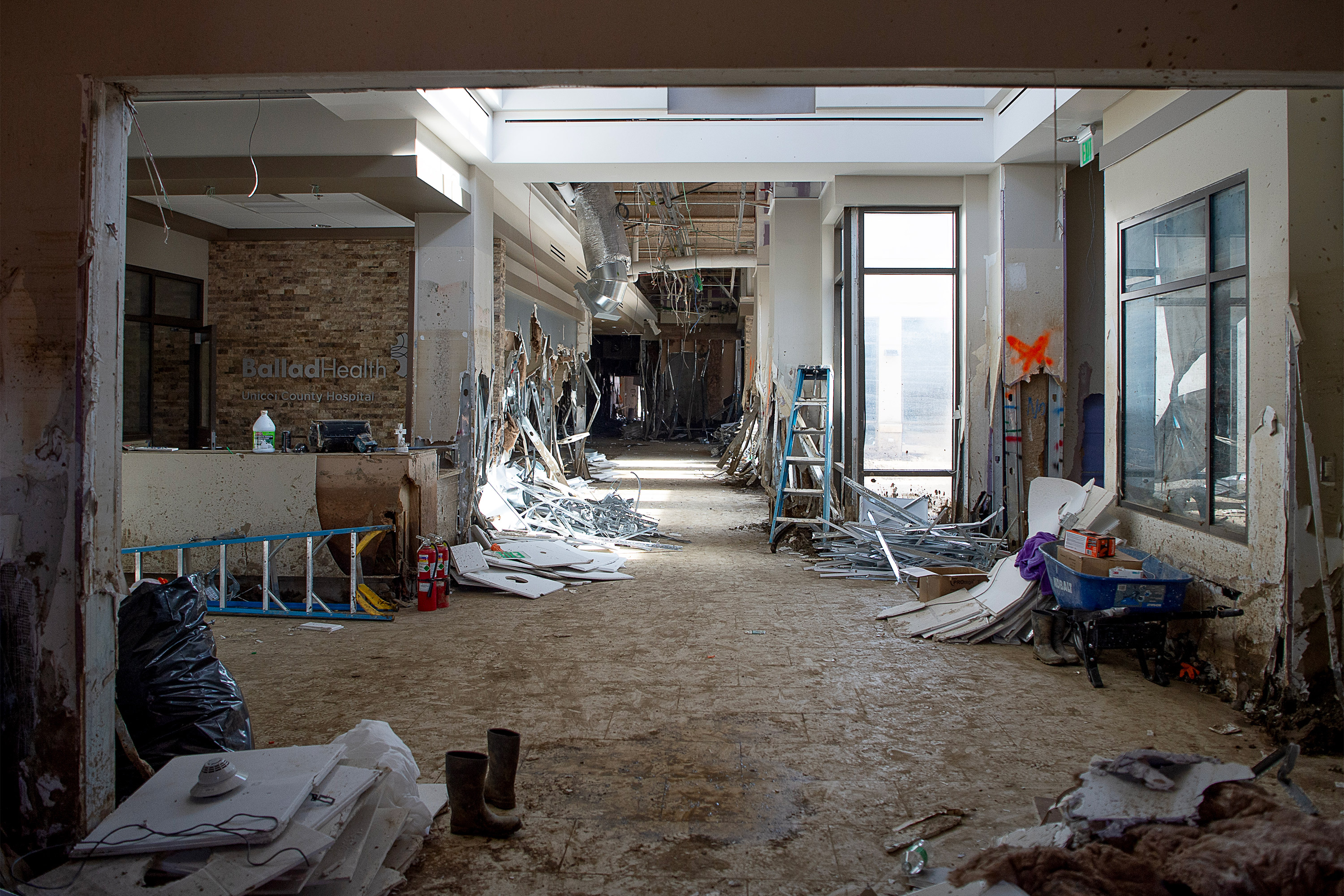 A photo of a hospital's front lobby in ruins.