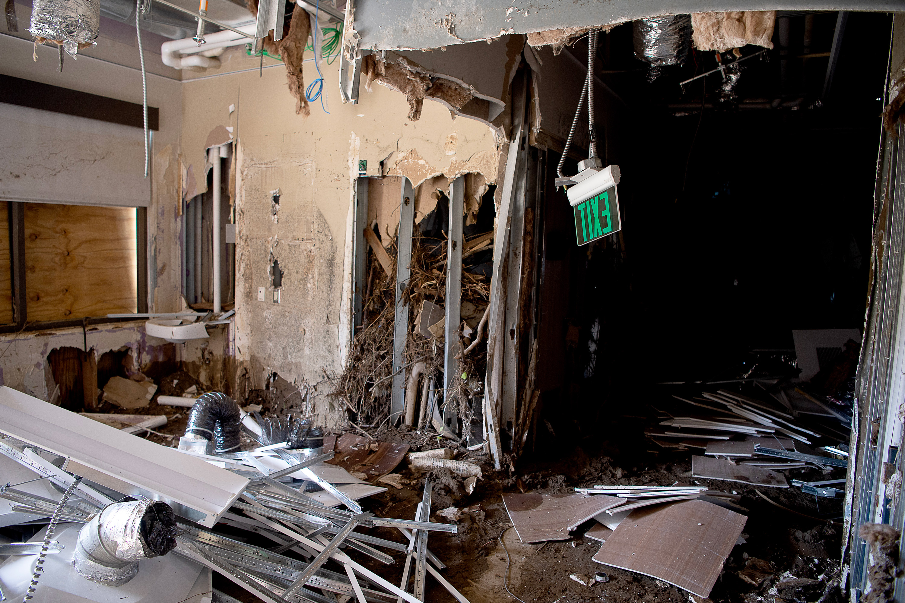 A photo of destruction and rubble inside of Unicoi County Hospital.