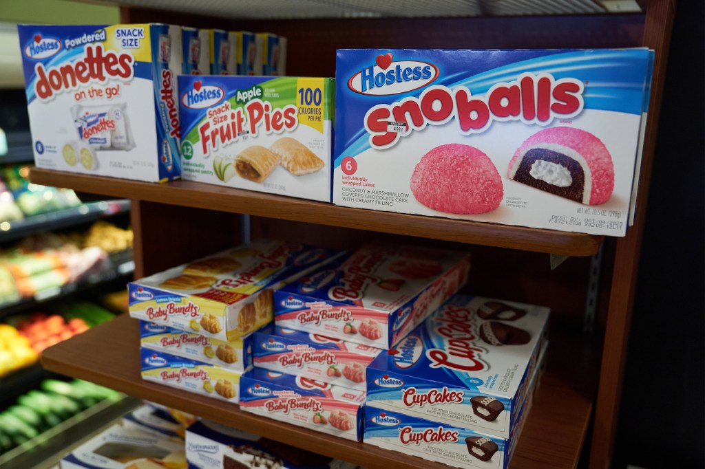 A photo of Hostess snack cakes for sale inside a grocery store.